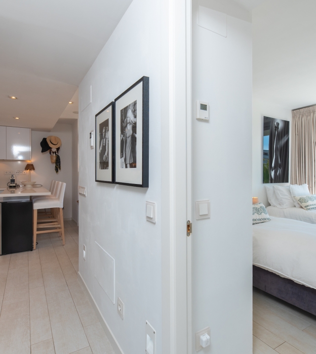 Resa Estates apartment for sale in Ibiza marina botafoch modern hallway and bedroom .jpg